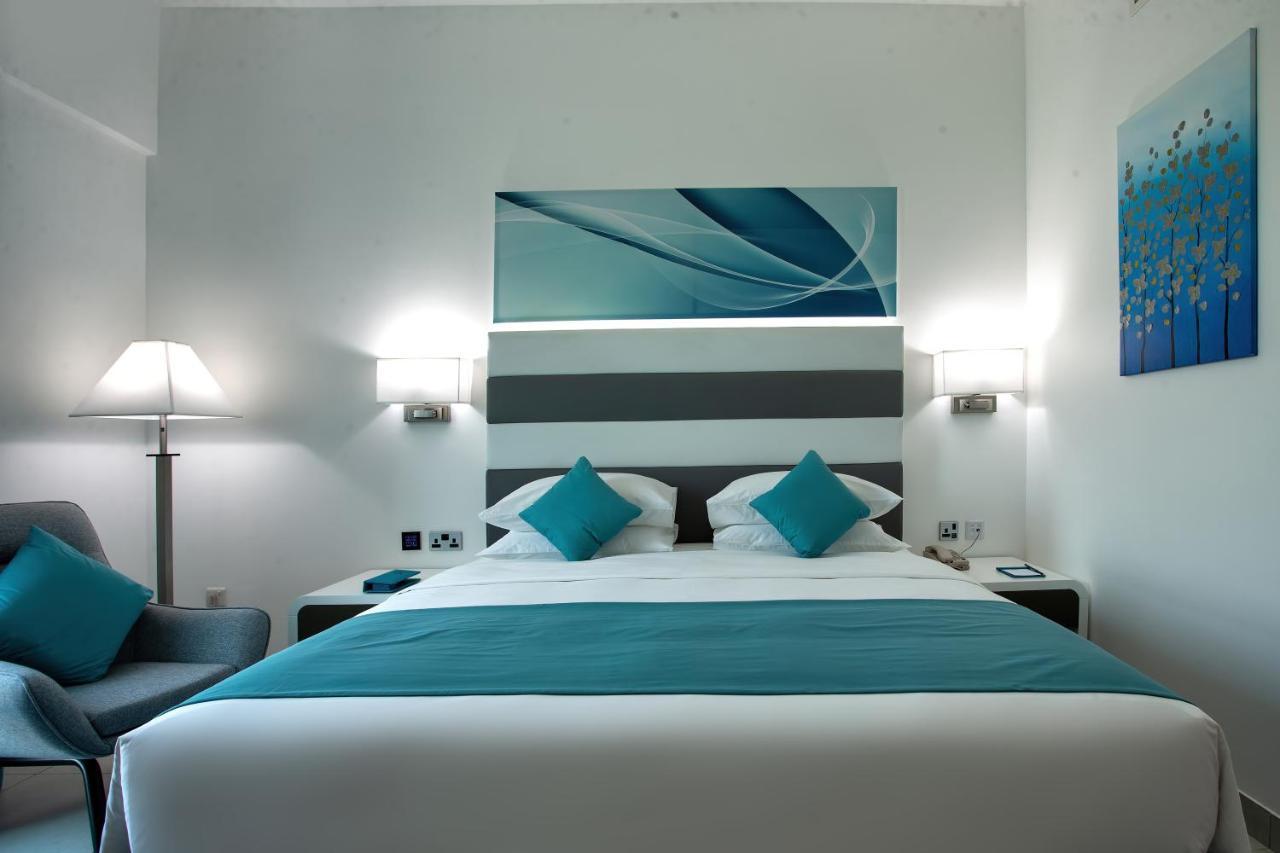 City Avenue Al Reqqa Hotel Дубай Екстериор снимка