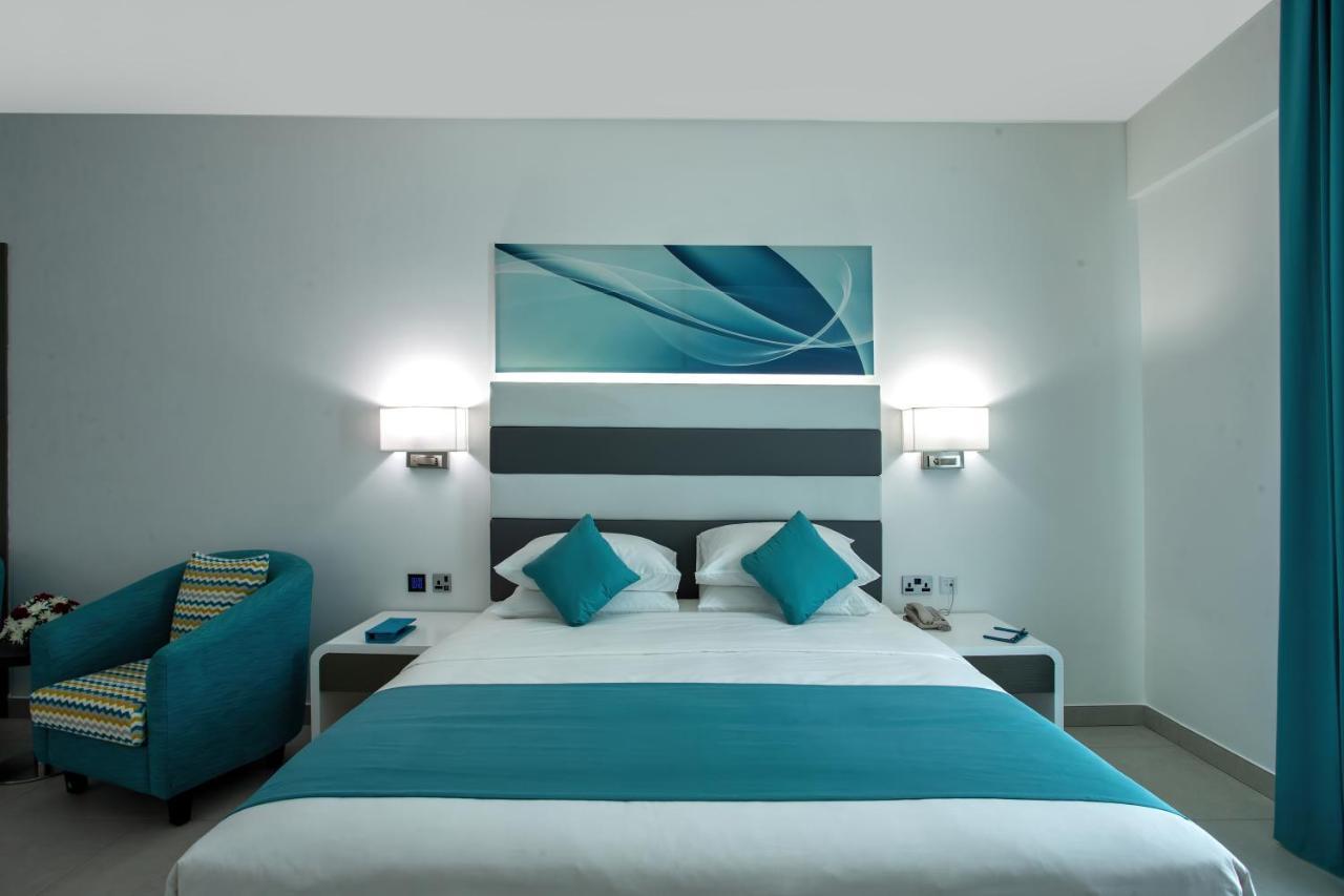 City Avenue Al Reqqa Hotel Дубай Екстериор снимка