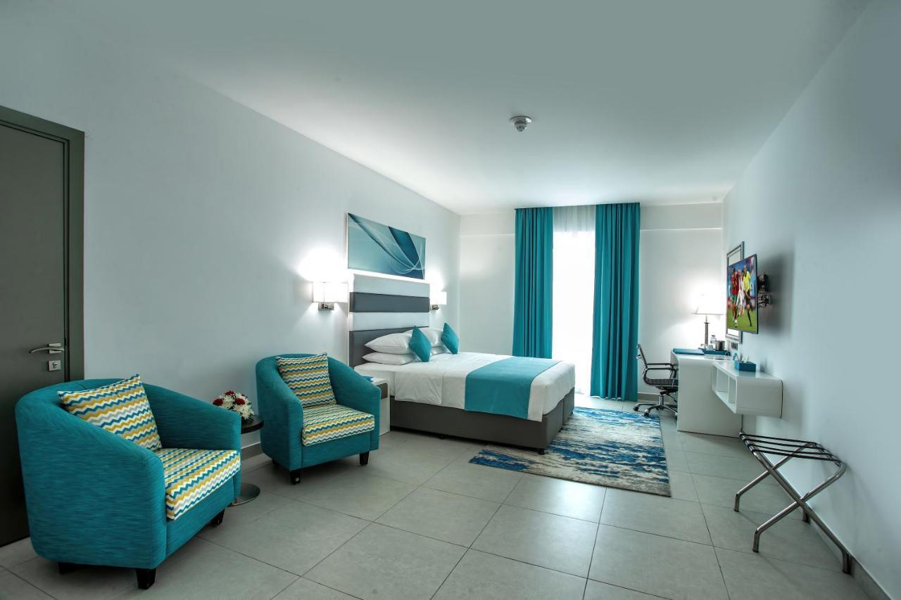 City Avenue Al Reqqa Hotel Дубай Екстериор снимка