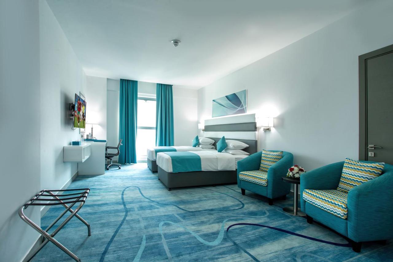 City Avenue Al Reqqa Hotel Дубай Екстериор снимка