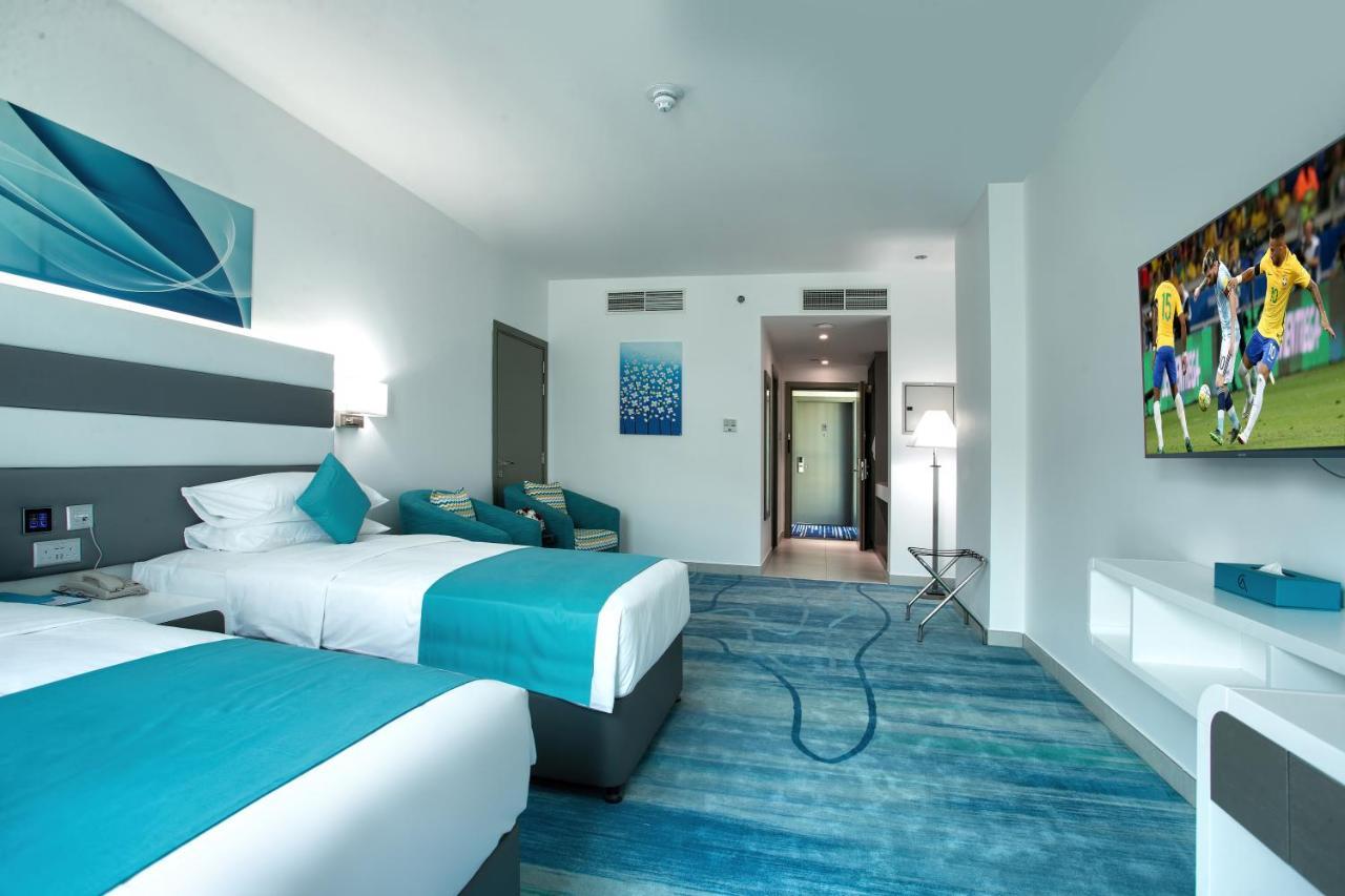 City Avenue Al Reqqa Hotel Дубай Екстериор снимка