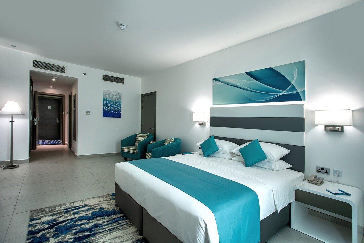 City Avenue Al Reqqa Hotel Дубай Екстериор снимка