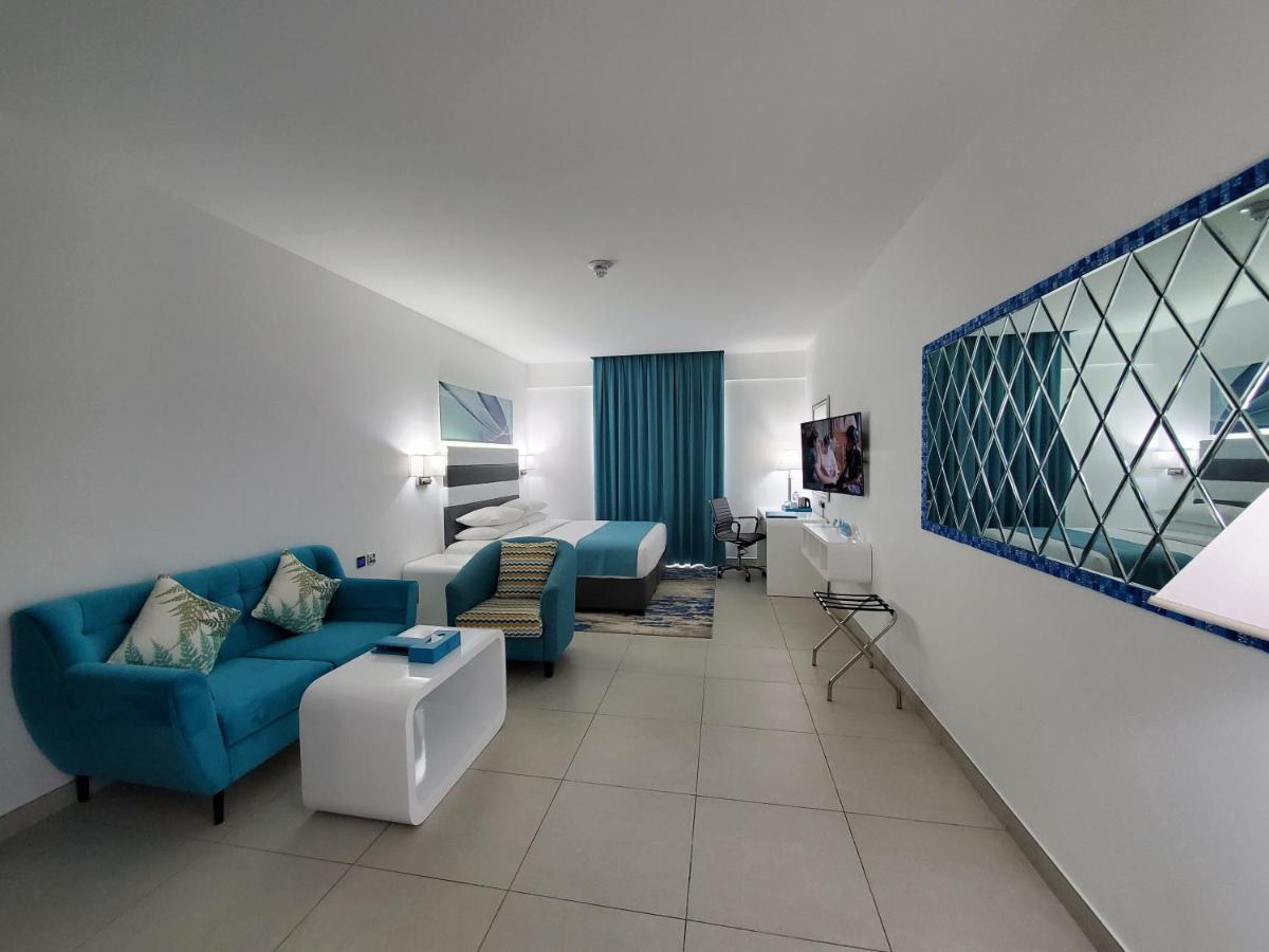 City Avenue Al Reqqa Hotel Дубай Екстериор снимка