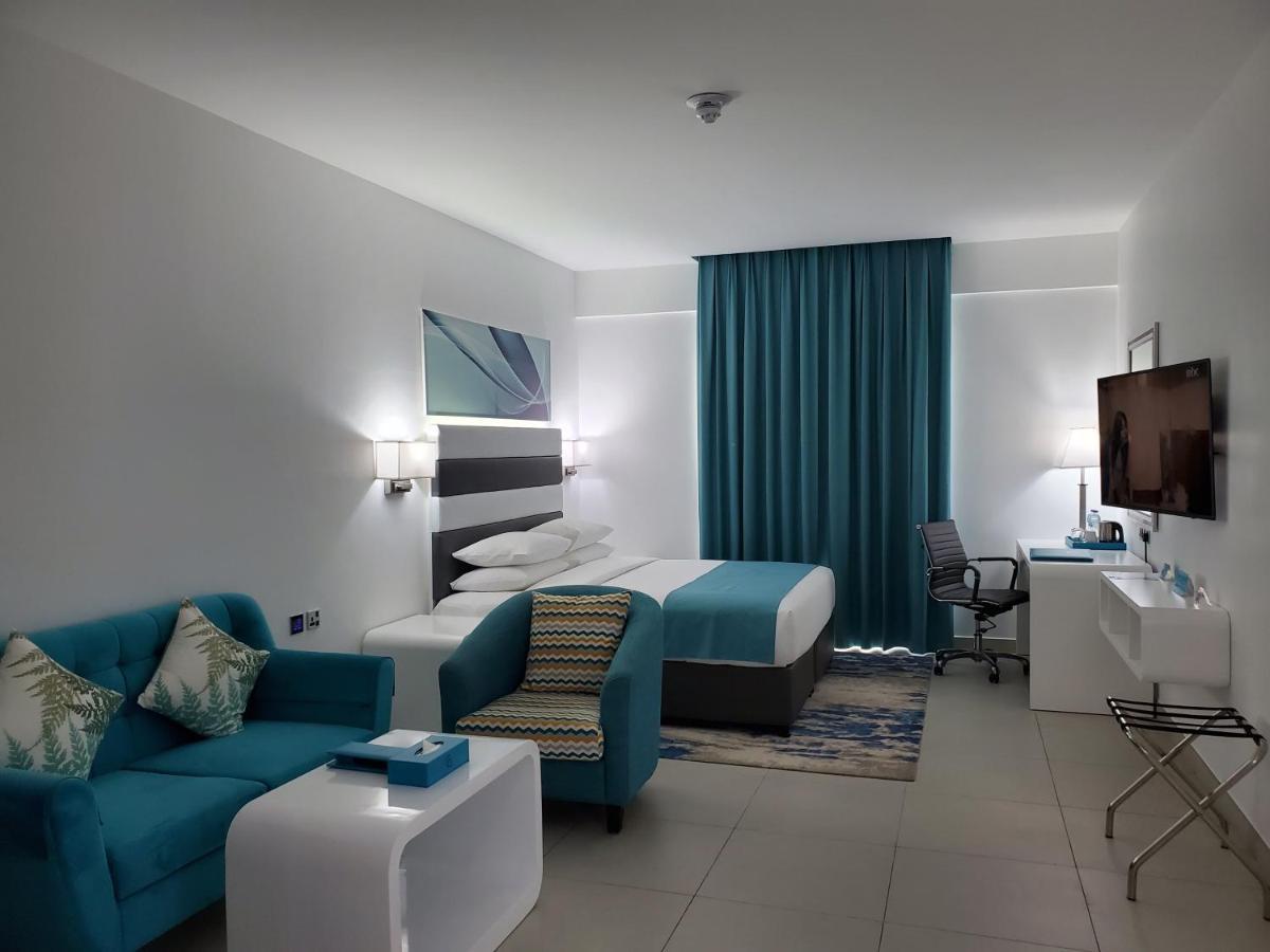 City Avenue Al Reqqa Hotel Дубай Екстериор снимка