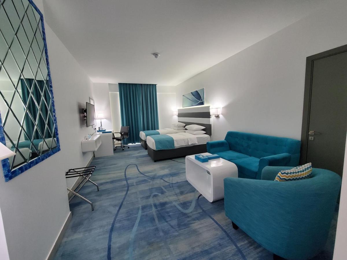 City Avenue Al Reqqa Hotel Дубай Екстериор снимка