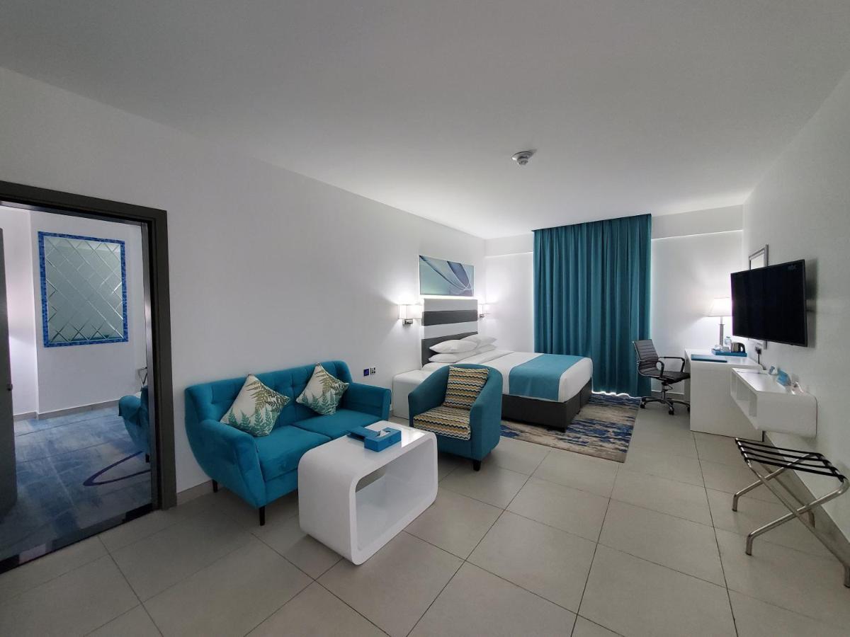 City Avenue Al Reqqa Hotel Дубай Екстериор снимка